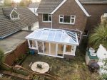 conservatory with french doors and a lantern roof from above