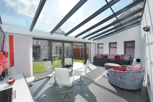 Modern lean to conservatory with glass roof