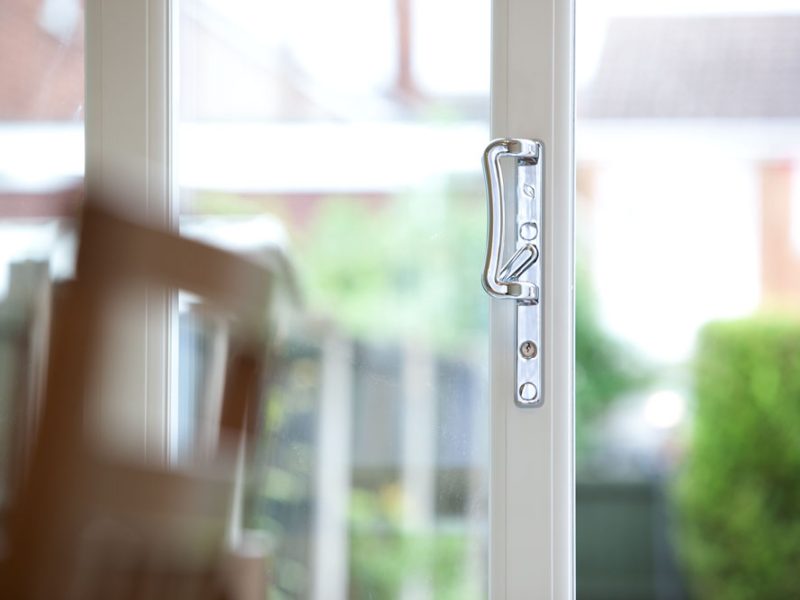 white patio doors with silver handle