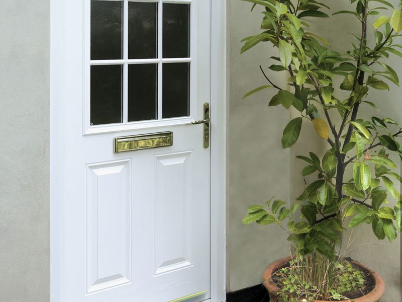 White uPVC front door with astragal bar double glazing