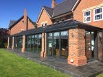 black and red brick extension with French Doors and guardian windows