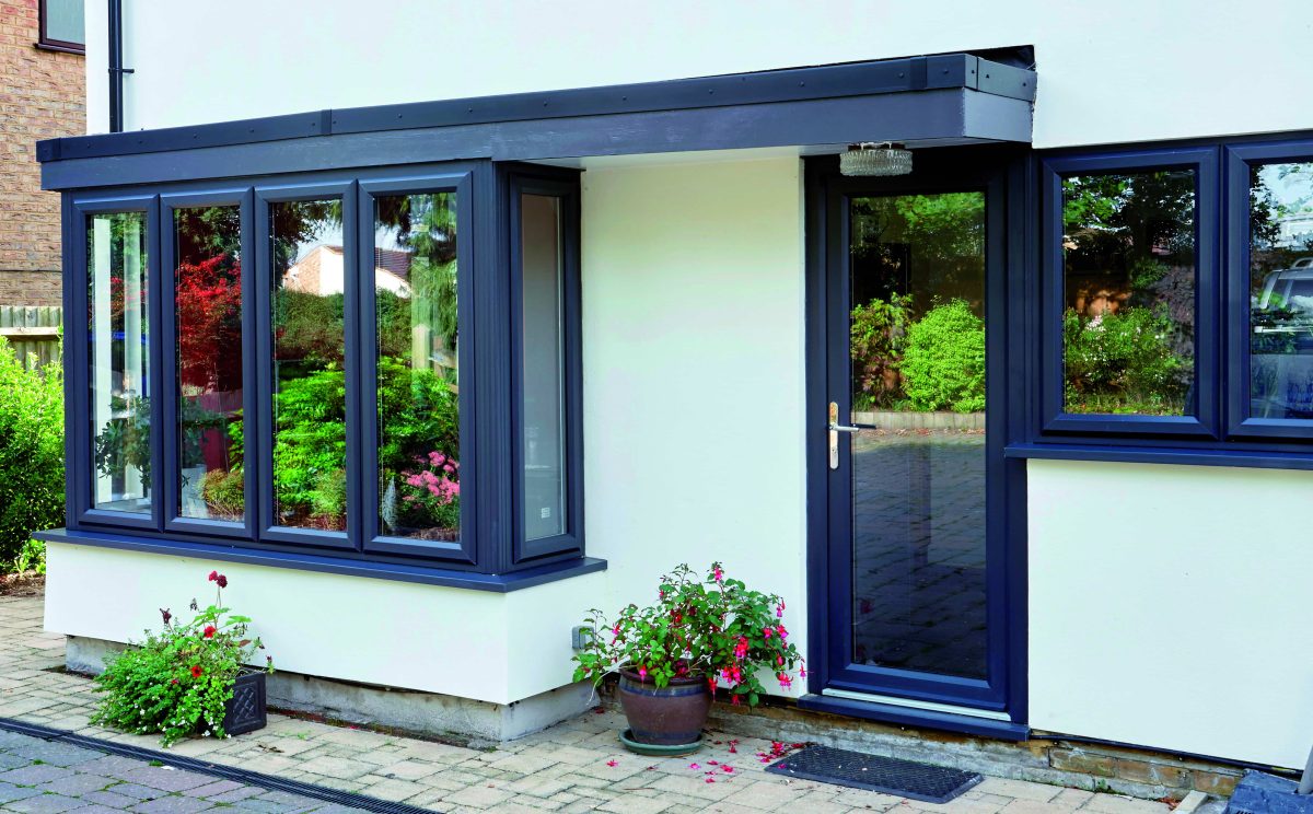 grey upvc casement windows and a double glazed back door with silver hadware