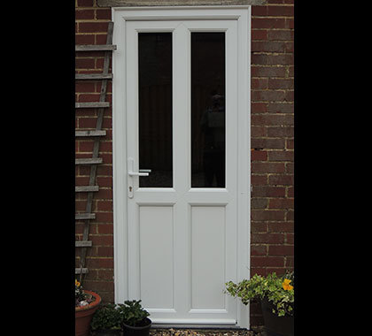 White double glazed uPVC garage door